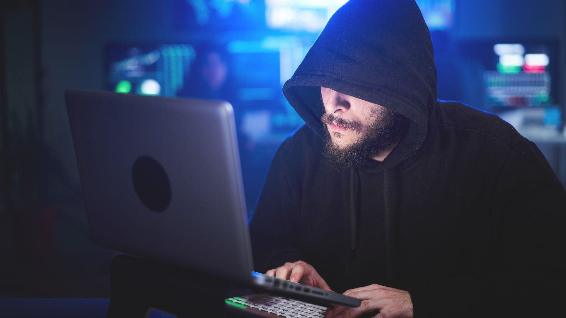 vCISO-Black-Hoodie-Hacking-Computer