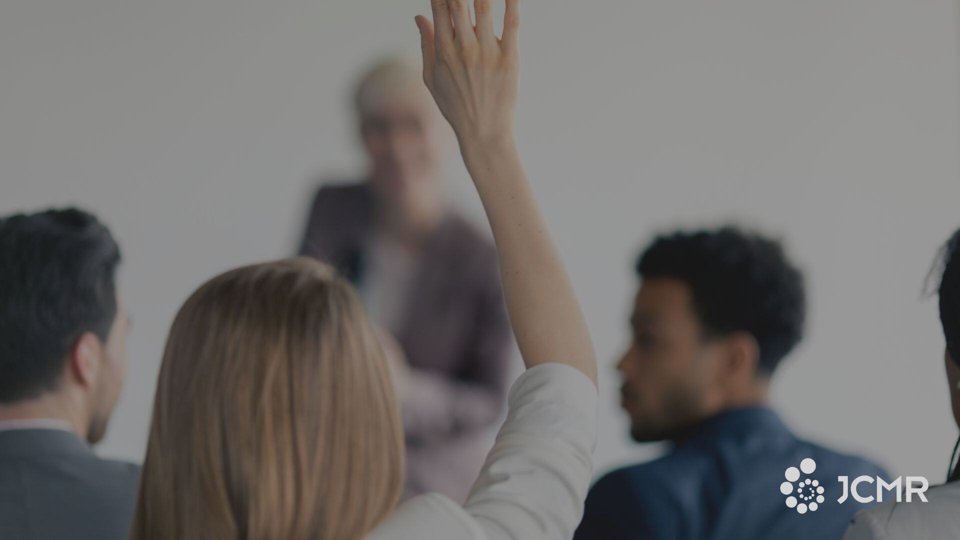 woman-raising-hand